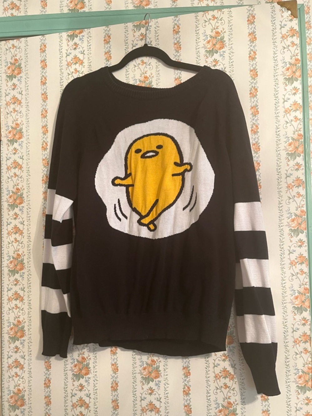 Sanrio Gudetama Black Cotton Sweater with Striped Sleeves and Yellow Graphic